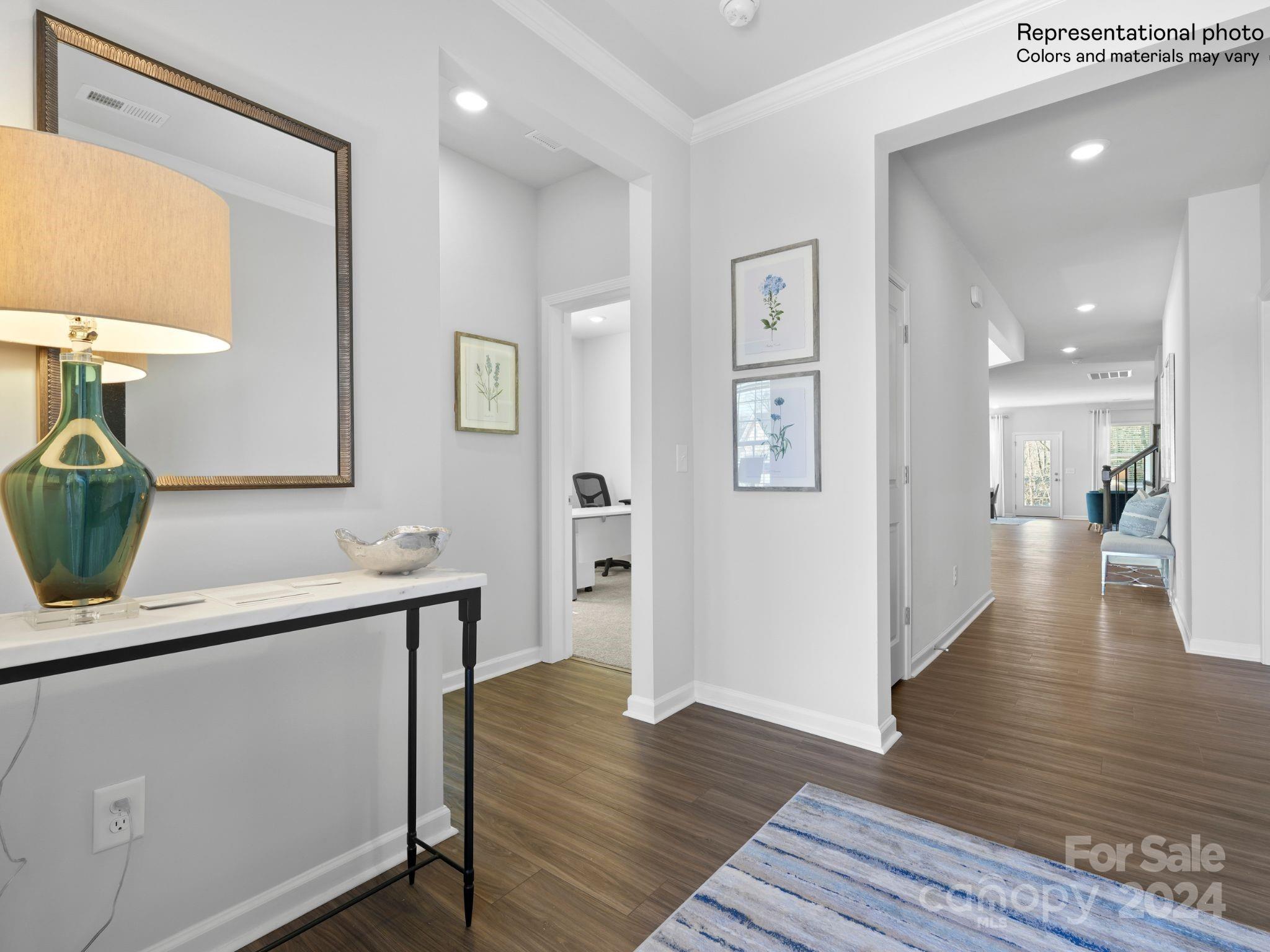 4451 Doyle Rdg Road Maiden, NC 28650 - Photo 2 of 21 a view of a hallway with wooden floor and staircase