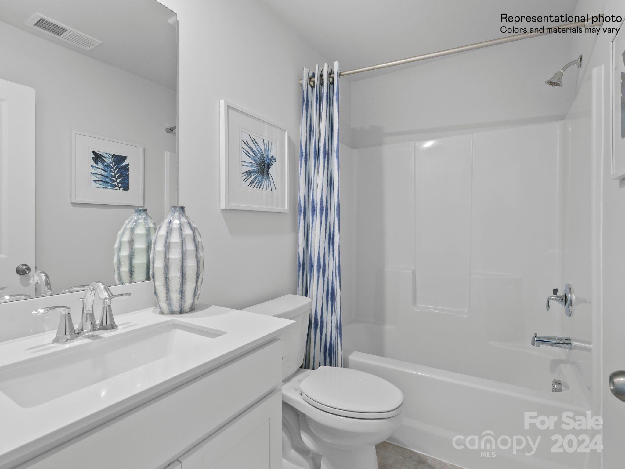 4451 Doyle Rdg Road Maiden, NC 28650 - Photo 21 of 21 a bathroom with a sink a toilet and shower