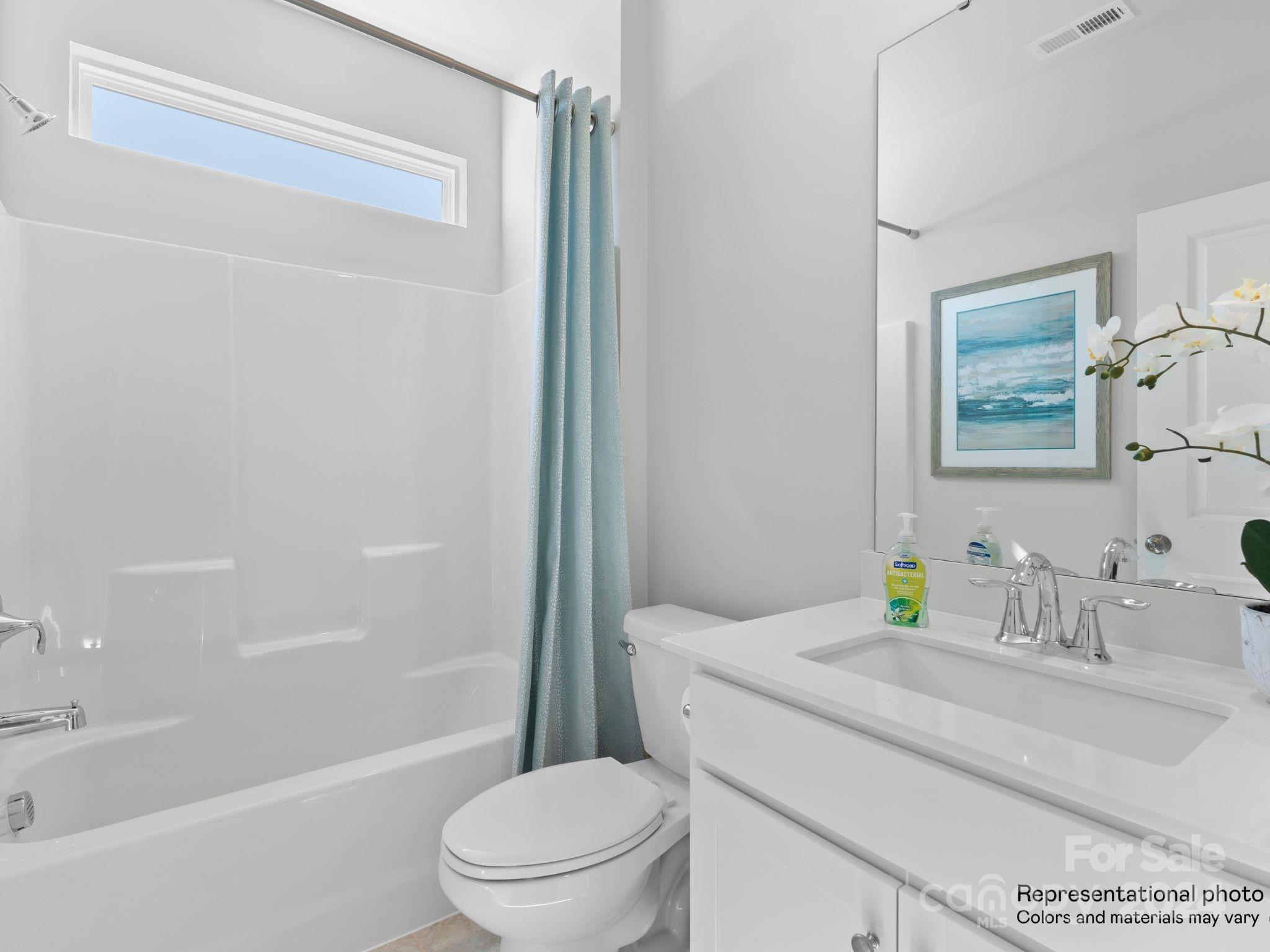 4451 Doyle Rdg Road Maiden, NC 28650 - Photo 3 of 21 a bathroom with a granite countertop sink toilet and shower