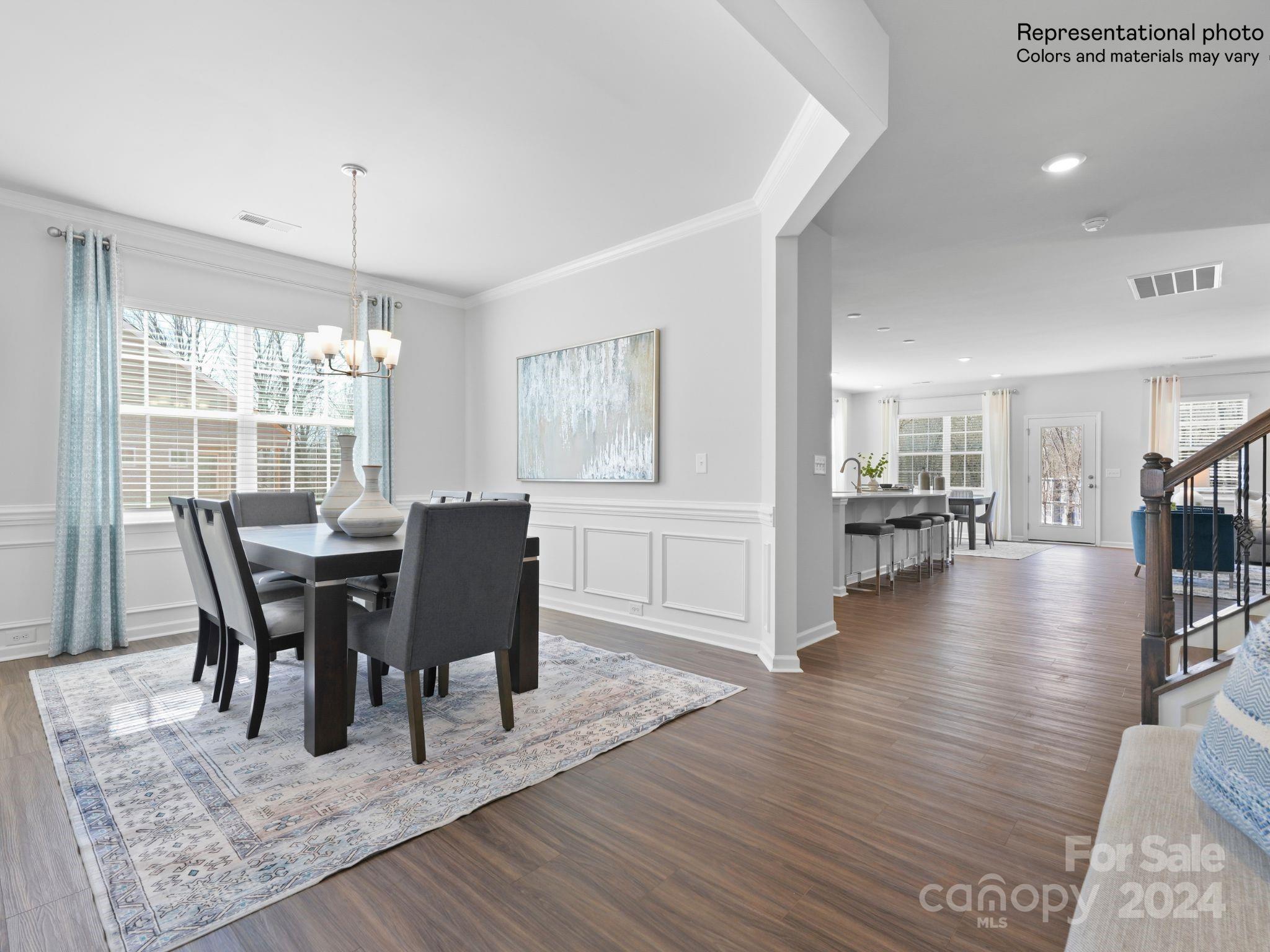 4451 Doyle Rdg Road Maiden, NC 28650 - Photo 4 of 21 a view of a dining room with furniture window and wooden floor