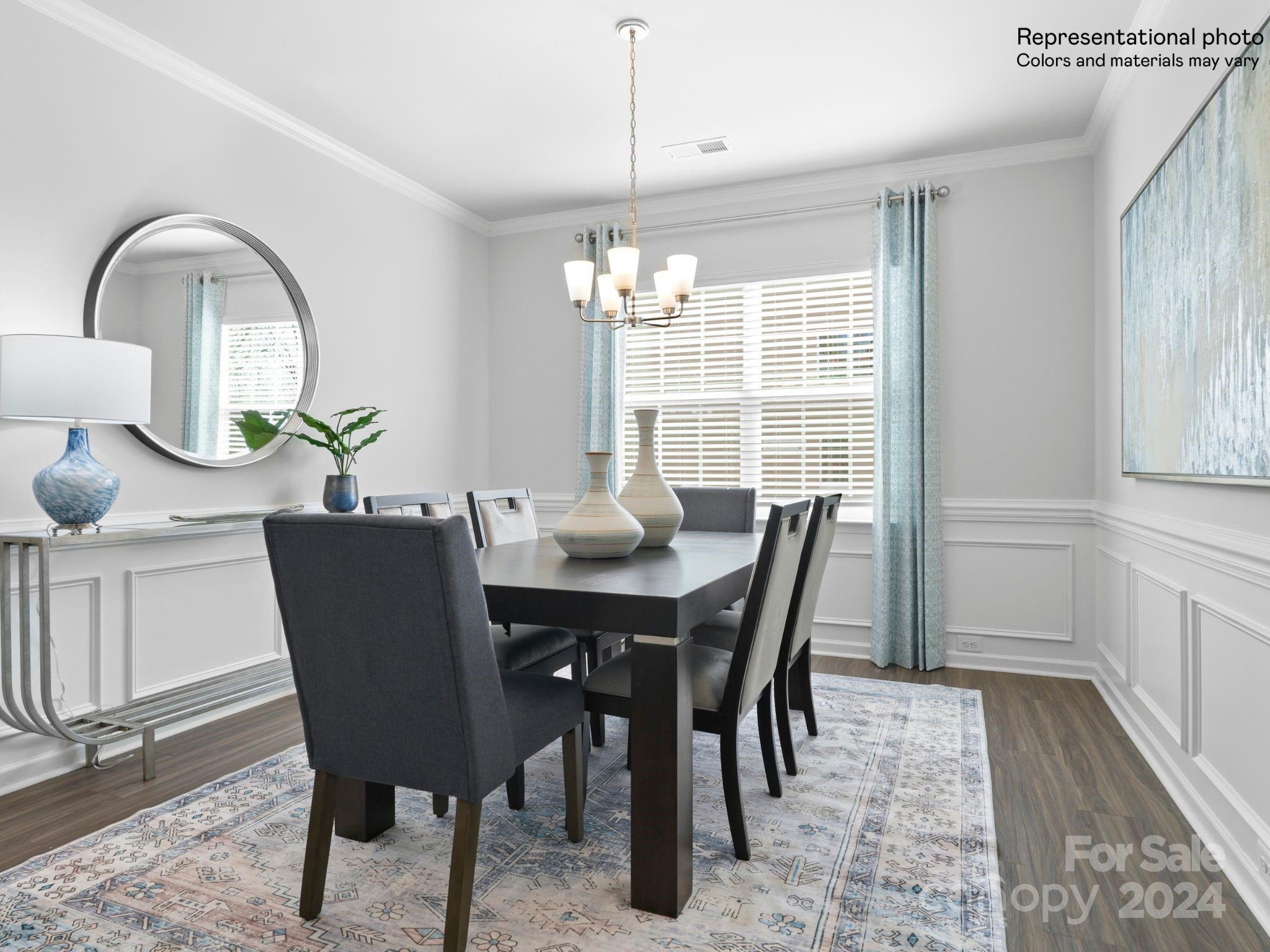 4451 Doyle Rdg Road Maiden, NC 28650 - Photo 5 of 21 a dining room with furniture a chandelier and wooden floor