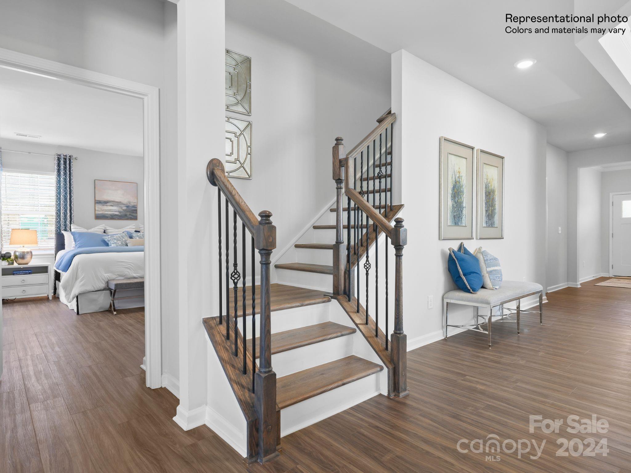 4451 Doyle Rdg Road Maiden, NC 28650 - Photo 6 of 21 a view of a hallway with wooden floor and stairs