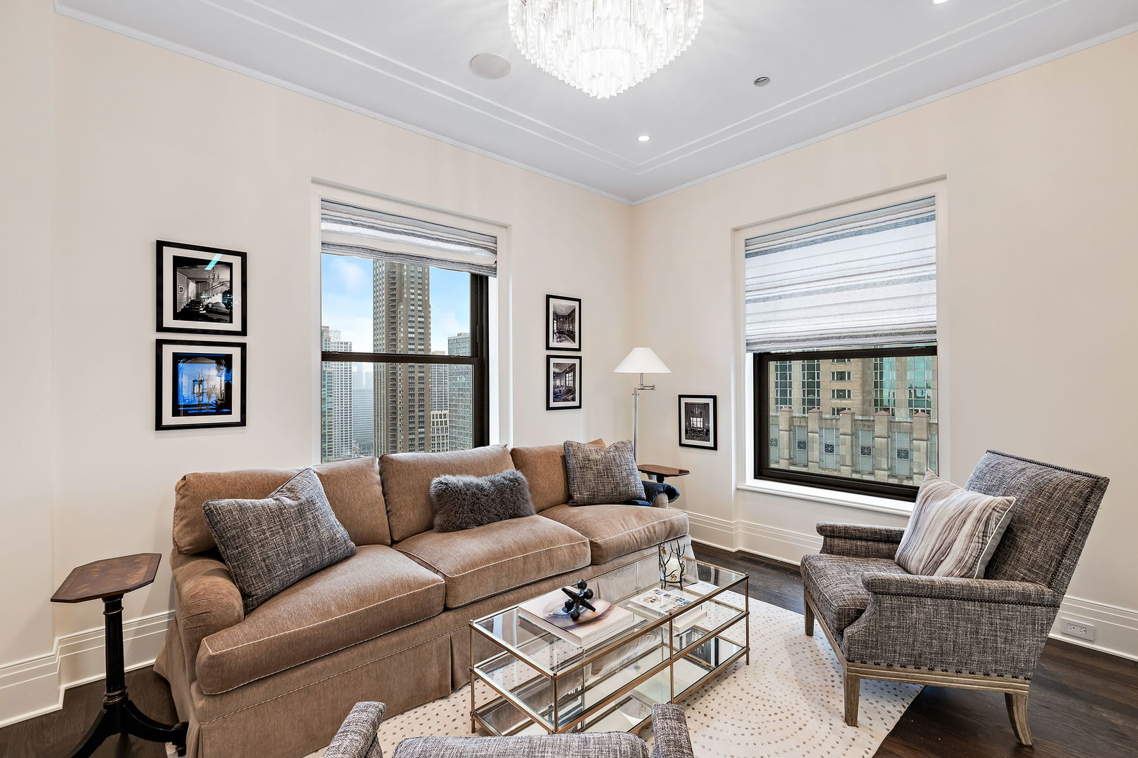 159 East Walton Place, Unit PH Chicago, IL 60611 - Photo 14 of 46 a living room with furniture and a window