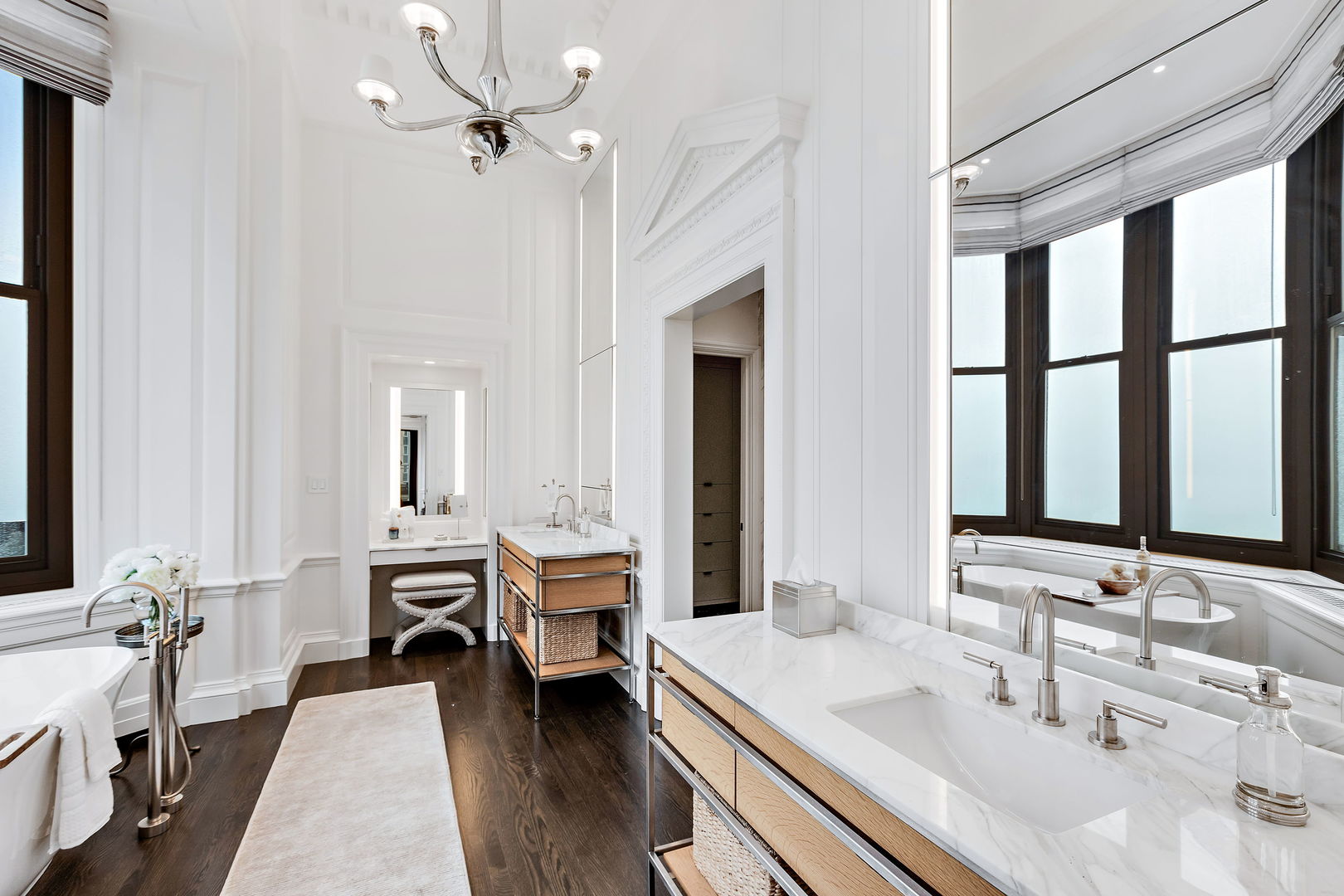 159 East Walton Place, Unit PH Chicago, IL 60611 - Photo 25 of 46 a en suite bathroom with a double vanity sink a mirror and a bathtub