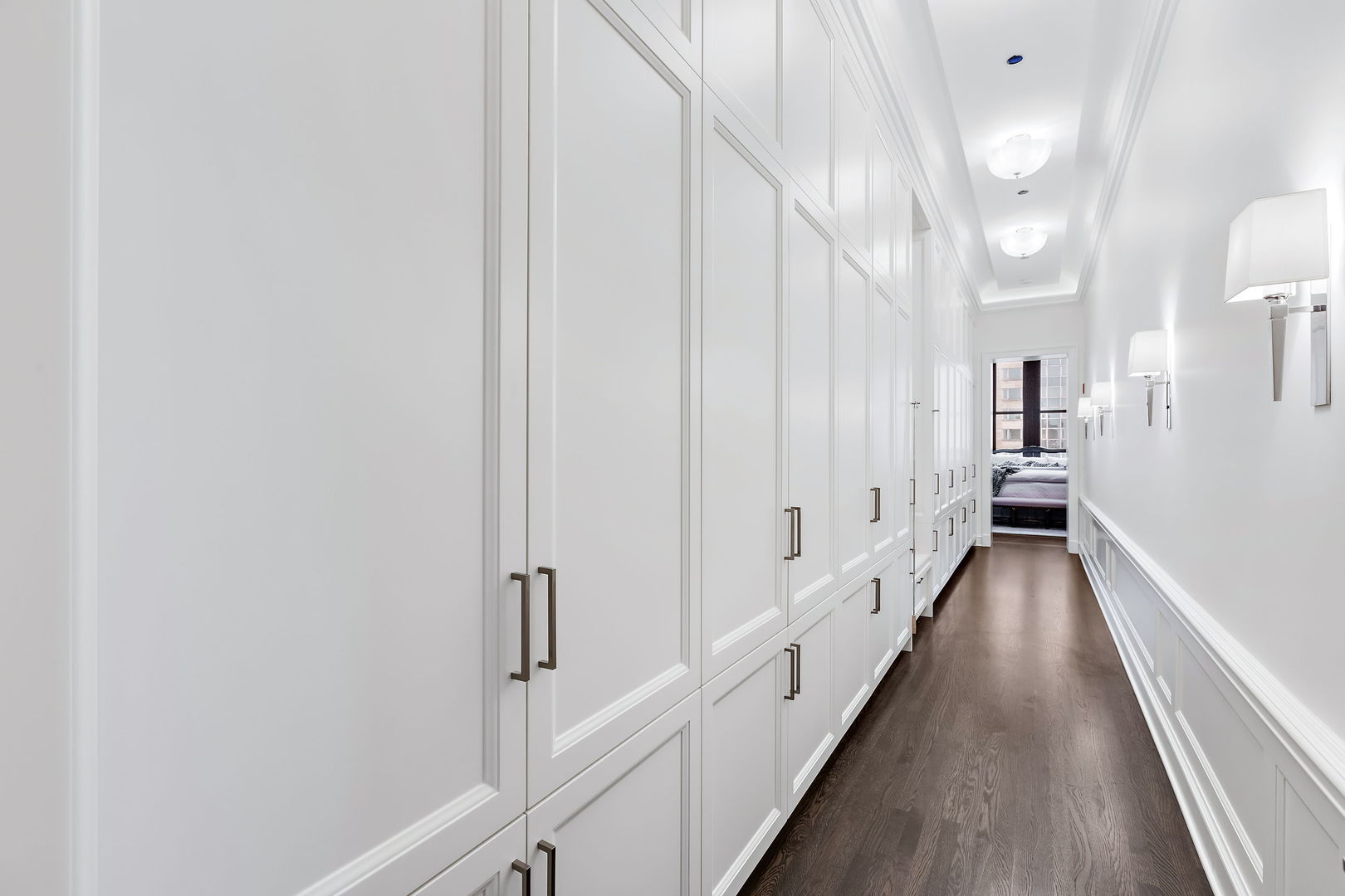 159 East Walton Place, Unit PH Chicago, IL 60611 - Photo 29 of 46 a view of a hallway with wooden floor