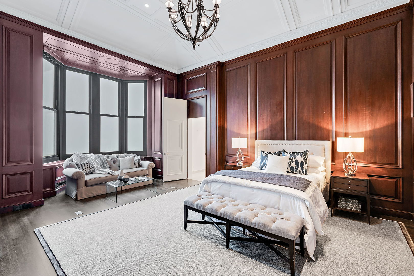 159 East Walton Place, Unit PH Chicago, IL 60611 - Photo 32 of 46 a bedroom with a bed and a couch