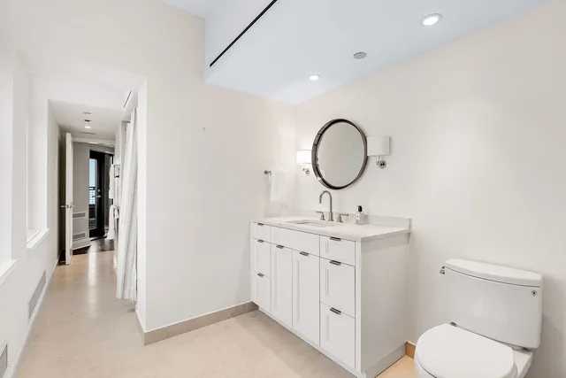 a view of a dining room with furniture and window