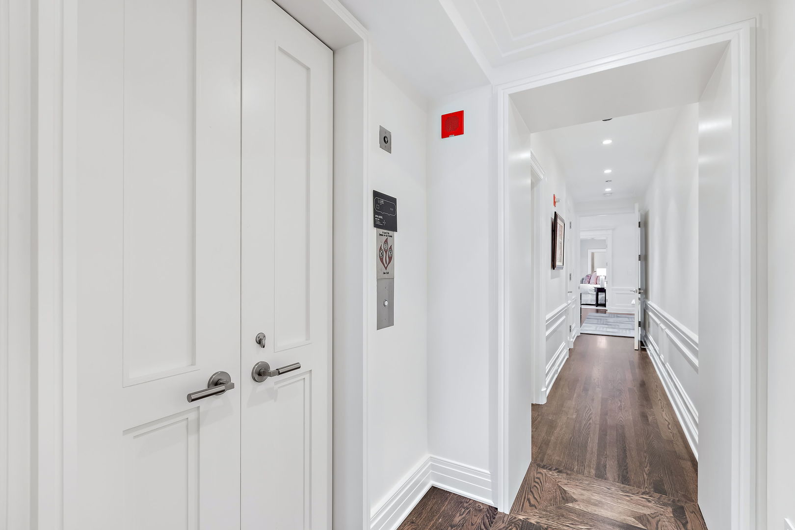 159 East Walton Place, Unit PH Chicago, IL 60611 - Photo 38 of 46 a view of a hallway with wooden floor and closet