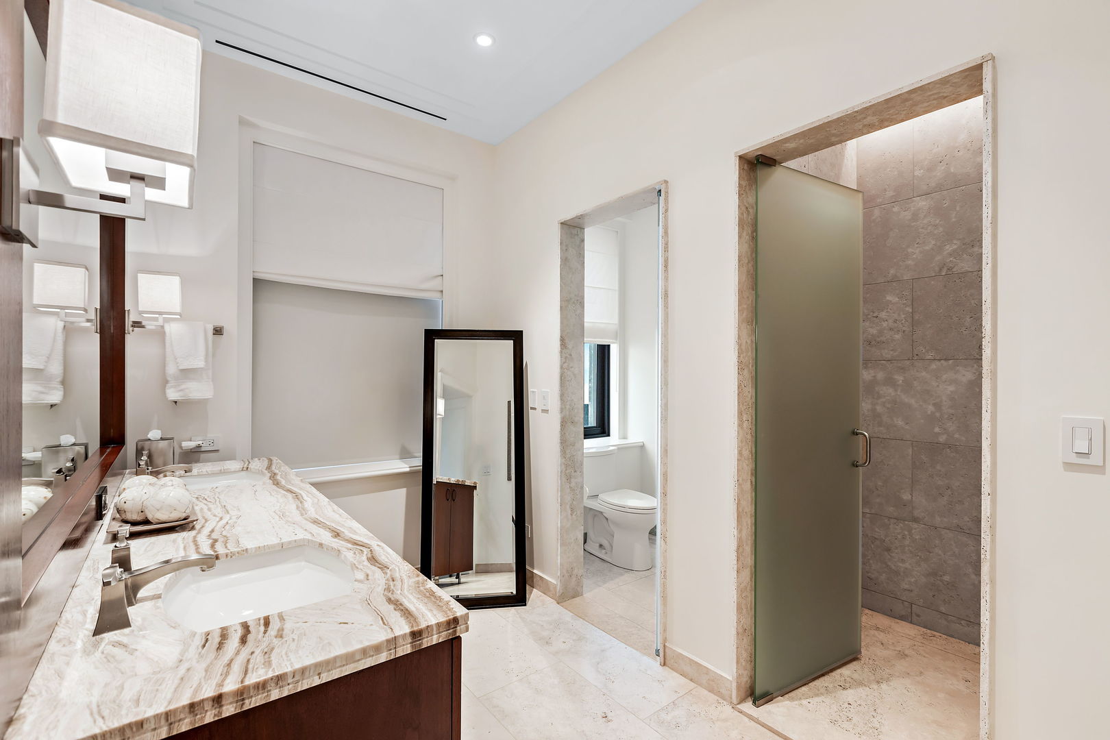 159 East Walton Place, Unit PH Chicago, IL 60611 - Photo 39 of 46 a bathroom with a granite countertop sink and a mirror