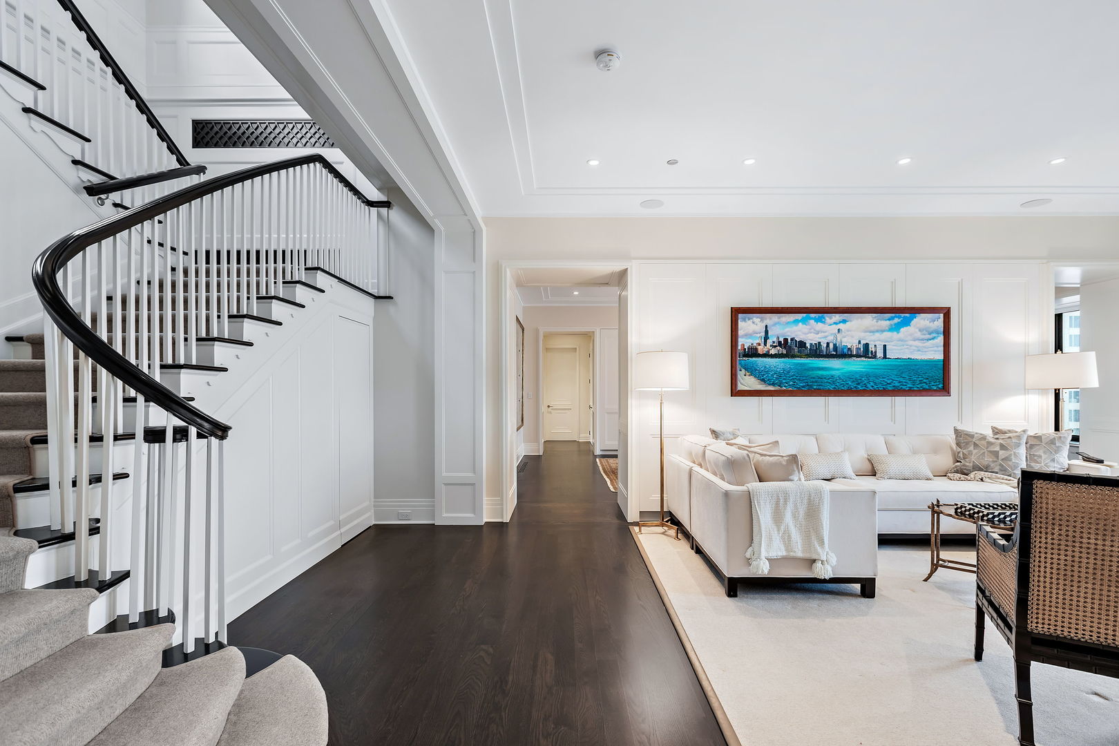 159 East Walton Place, Unit PH Chicago, IL 60611 - Photo 4 of 46 a living room with furniture and a flat screen tv