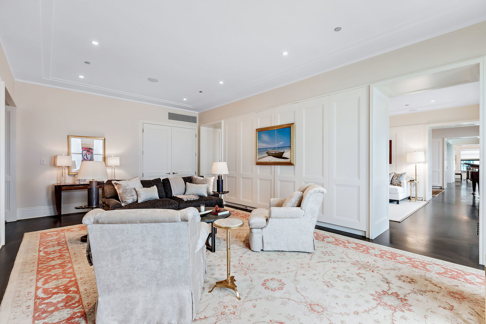 159 East Walton Place, Unit PH Chicago, IL 60611 - Photo 7 of 46 a living room with furniture and a wooden floor