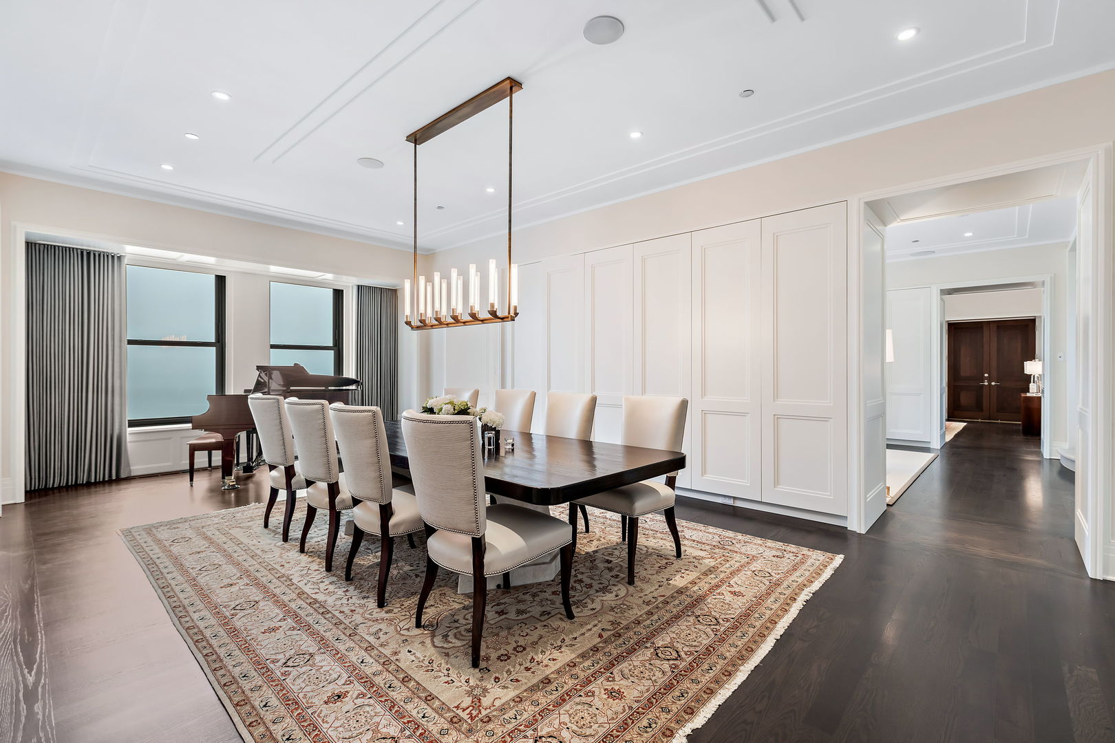 159 East Walton Place, Unit PH Chicago, IL 60611 - Photo 9 of 46 a dining room with furniture window and wooden floor