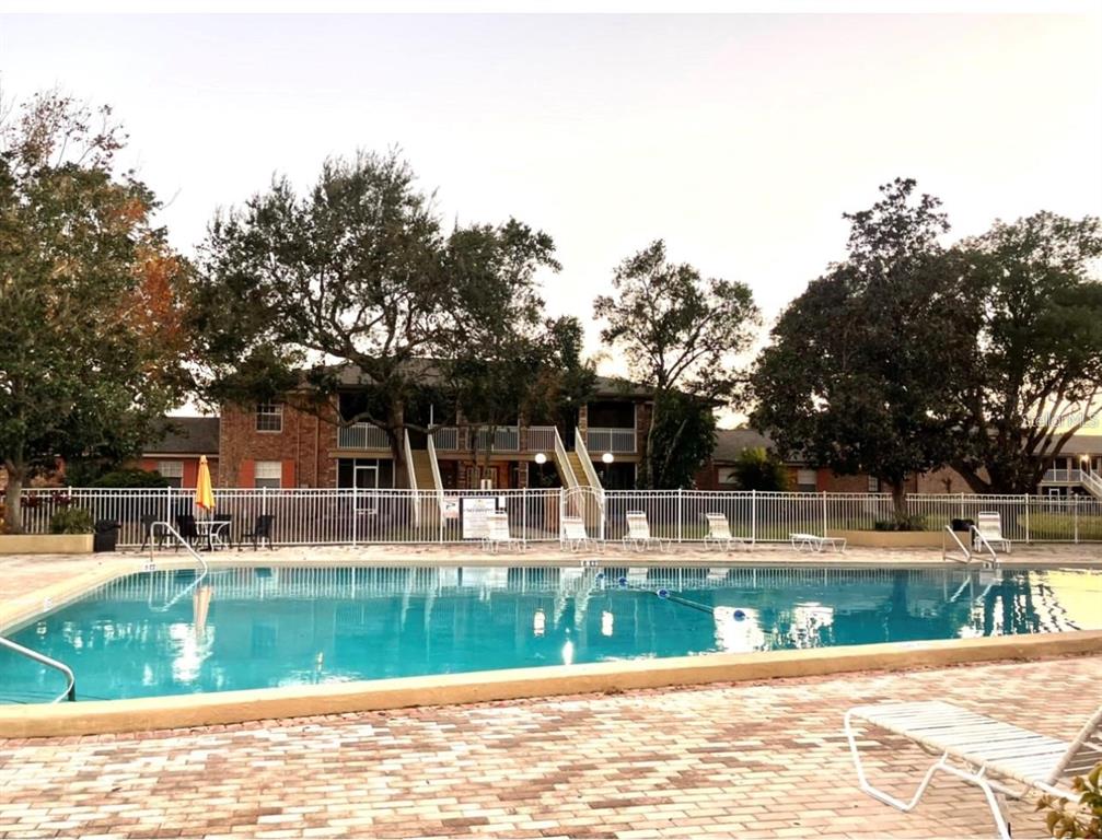 550 Flemming Way, Unit 200 Maitland, FL 32751 - Photo 11 of 11 a view of swimming pool with outdoor seating and yard