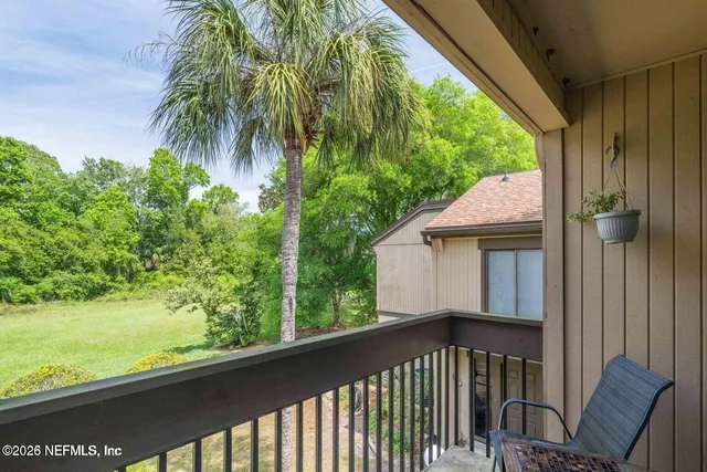 a view of a porch with a yard
