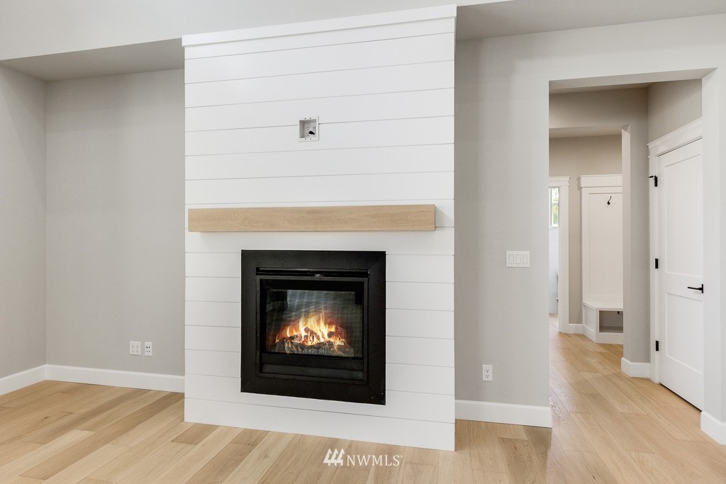 3010 230th Place Southeast Bothell, WA 98021 - Photo 16 of 17 a living room with a fireplace