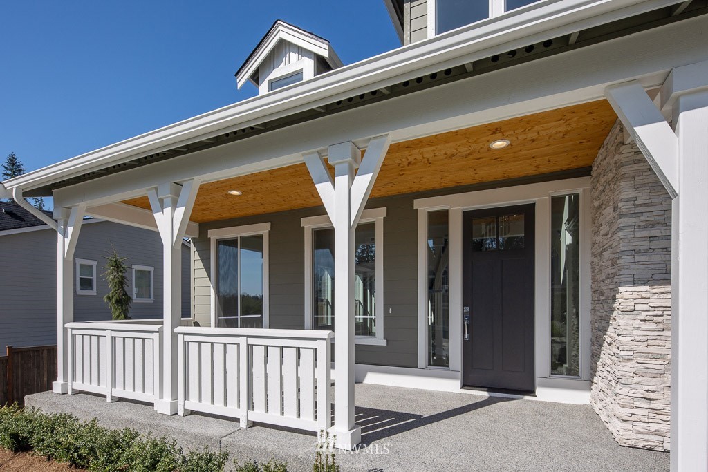 3010 230th Place Southeast Bothell, WA 98021 - Photo 3 of 17 a view of porch with a bench
