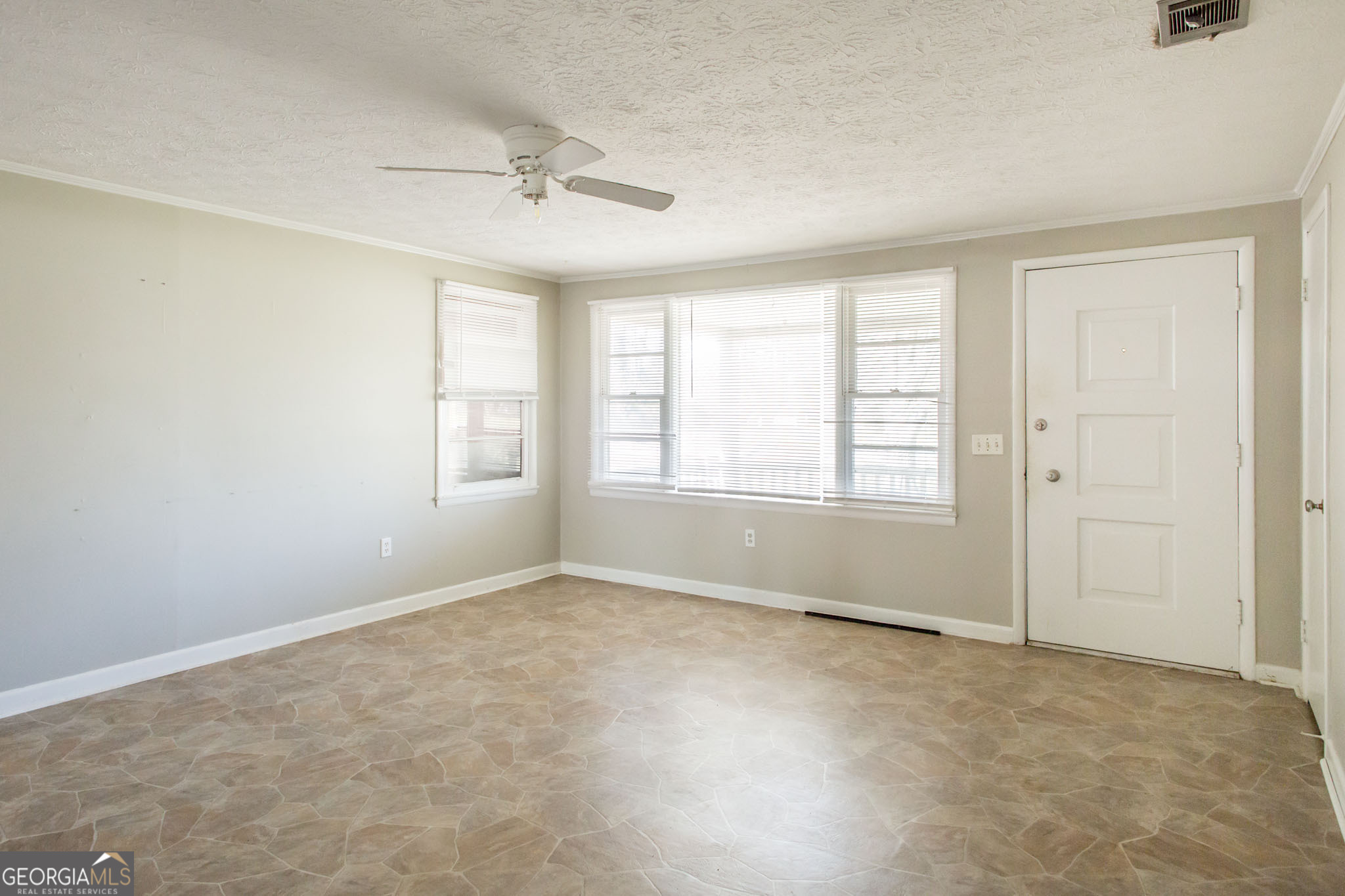 902 Stanton Avenue Waycross, GA 31503 - Photo 20 of 38 a view of an empty room with a window