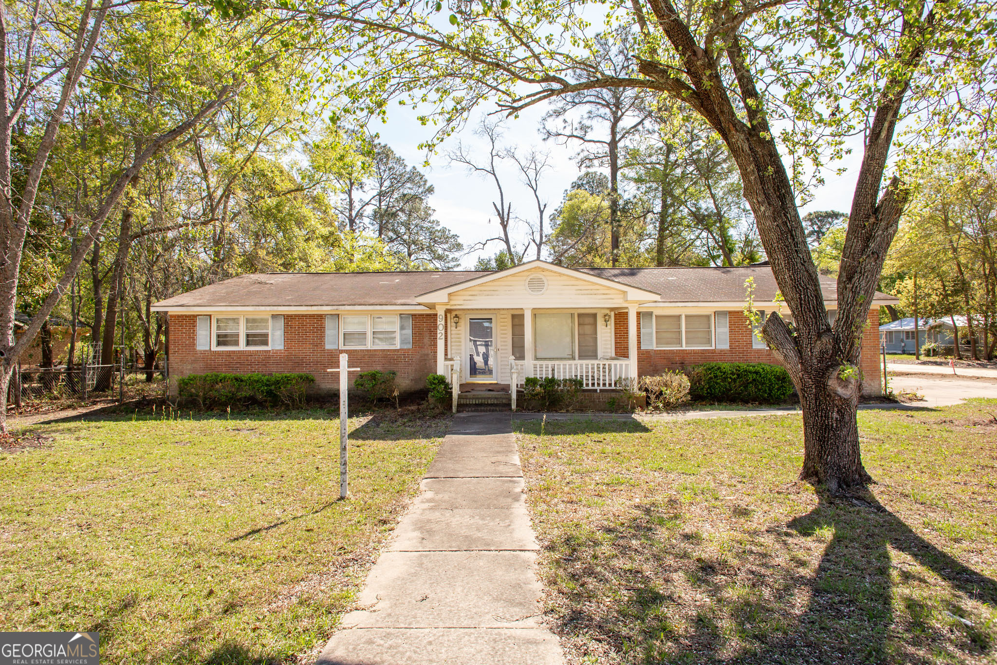 902 Stanton Avenue Waycross, GA 31503 - Photo 2 of 38 a front view of a house with a yard
