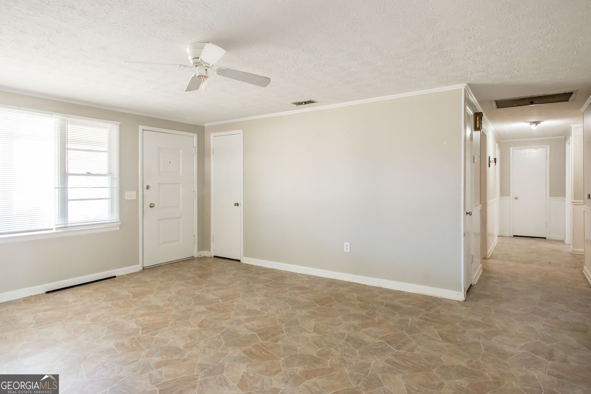 902 Stanton Avenue Waycross, GA 31503 - Photo 21 of 38 a view of an empty room with a window