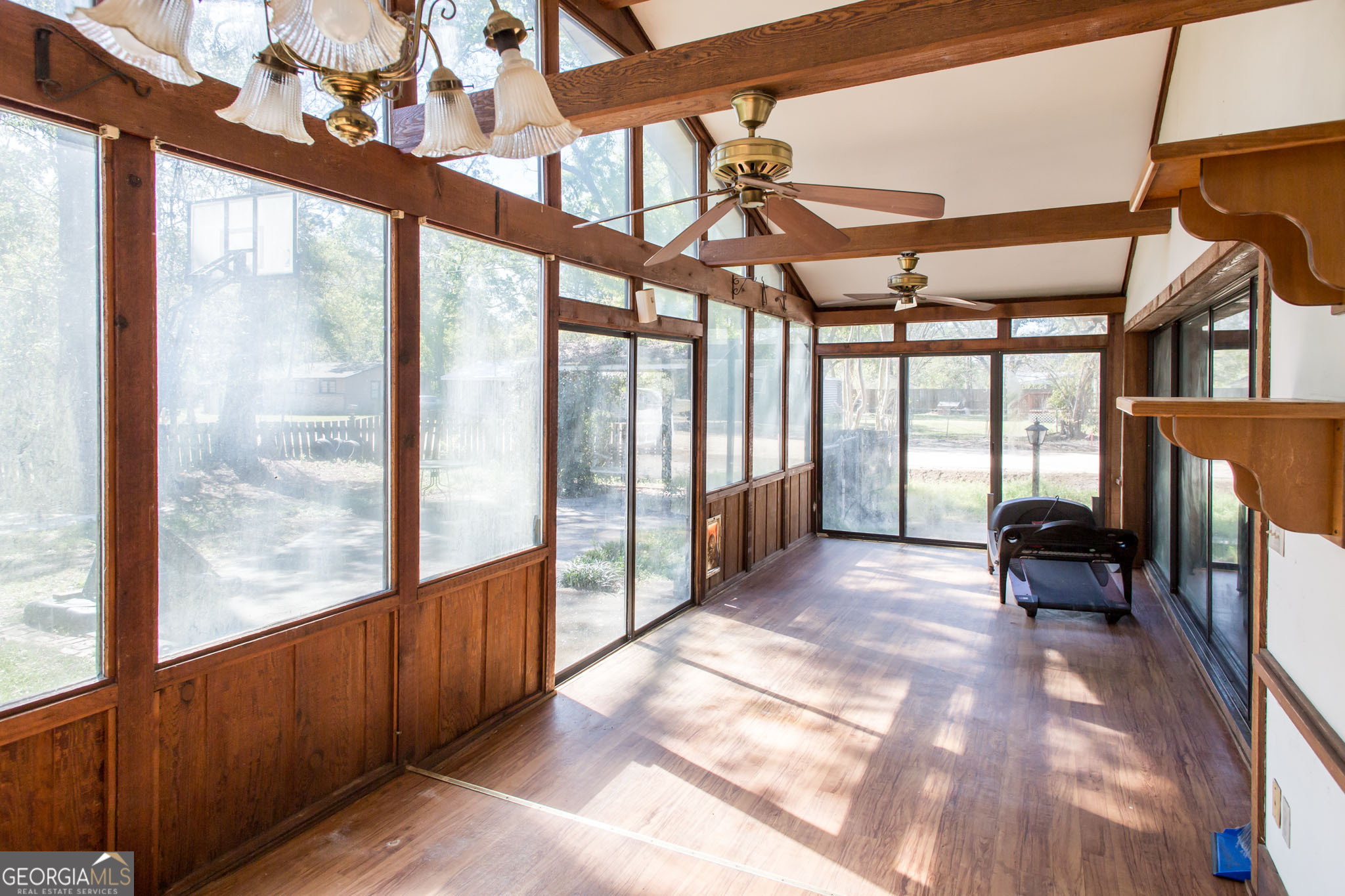 902 Stanton Avenue Waycross, GA 31503 - Photo 24 of 38 a view of porch with a table and chairs
