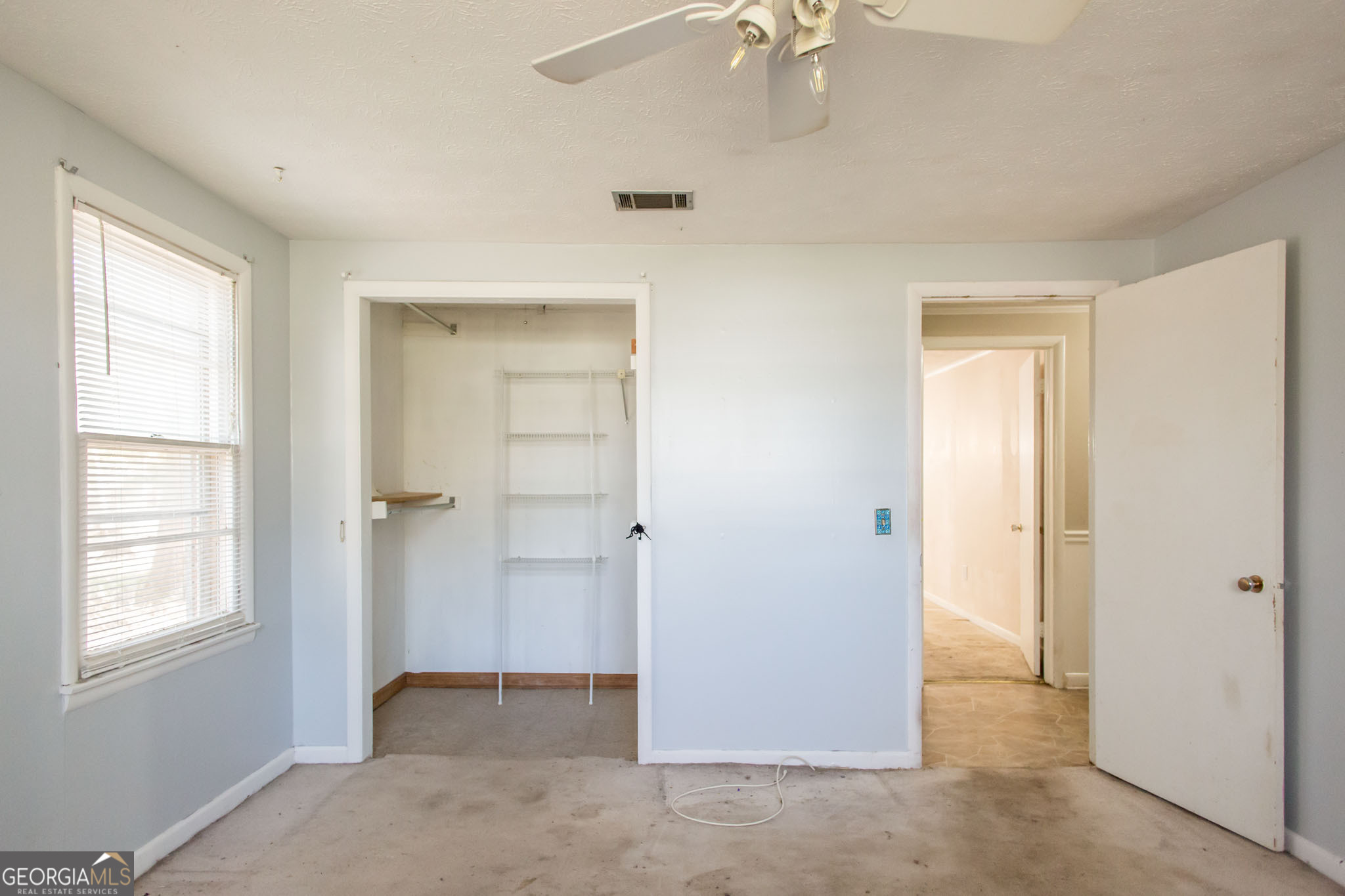 902 Stanton Avenue Waycross, GA 31503 - Photo 31 of 38 a view of an empty room with a window