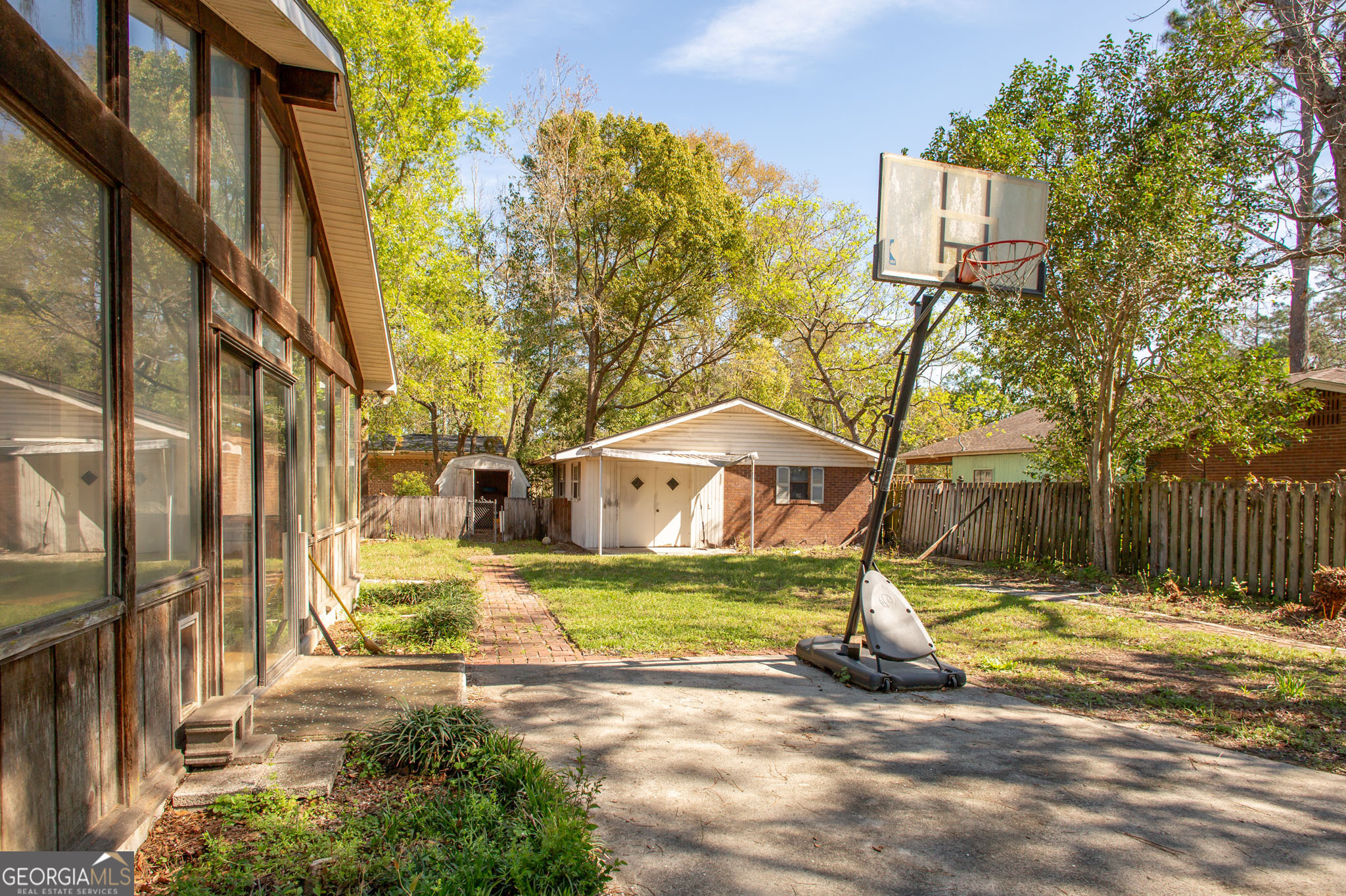 902 Stanton Avenue Waycross, GA 31503 - Photo 6 of 38 a view of a house with yard and sitting area