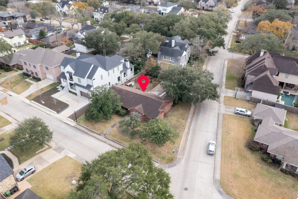 3647 Aberdeen Way Houston, TX 77025 - Photo 2 of 32 an aerial view of residential houses with outdoor space