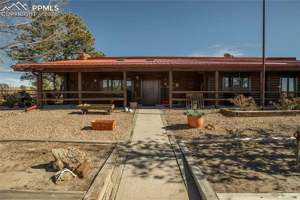 an outdoor space view of a house with a patio