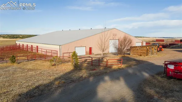 a view of a swimming pool and an outdoor space