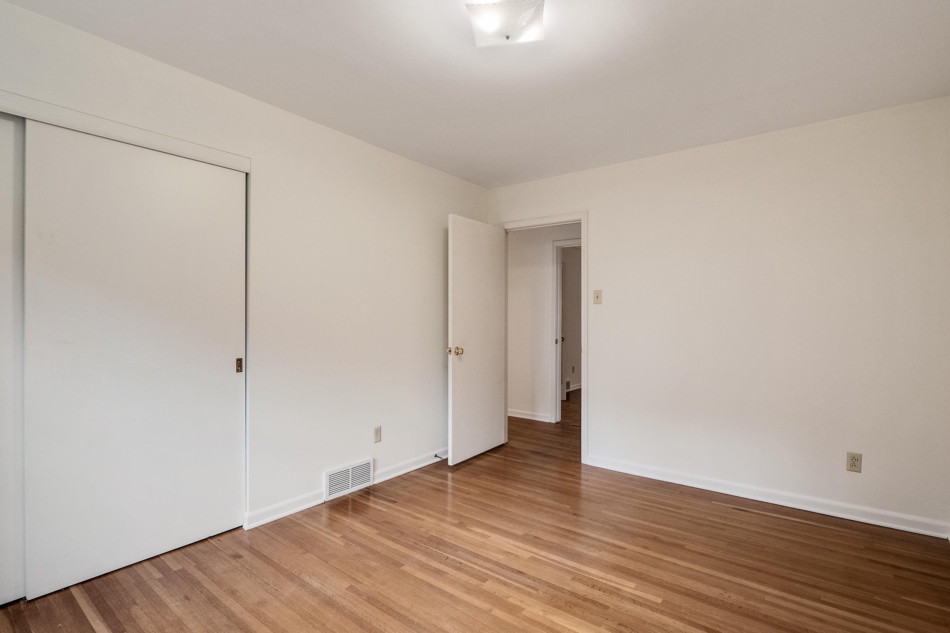 5500 Quince Road Memphis, TN 38119 - Photo 21 of 31 a view of an empty room with wooden floor