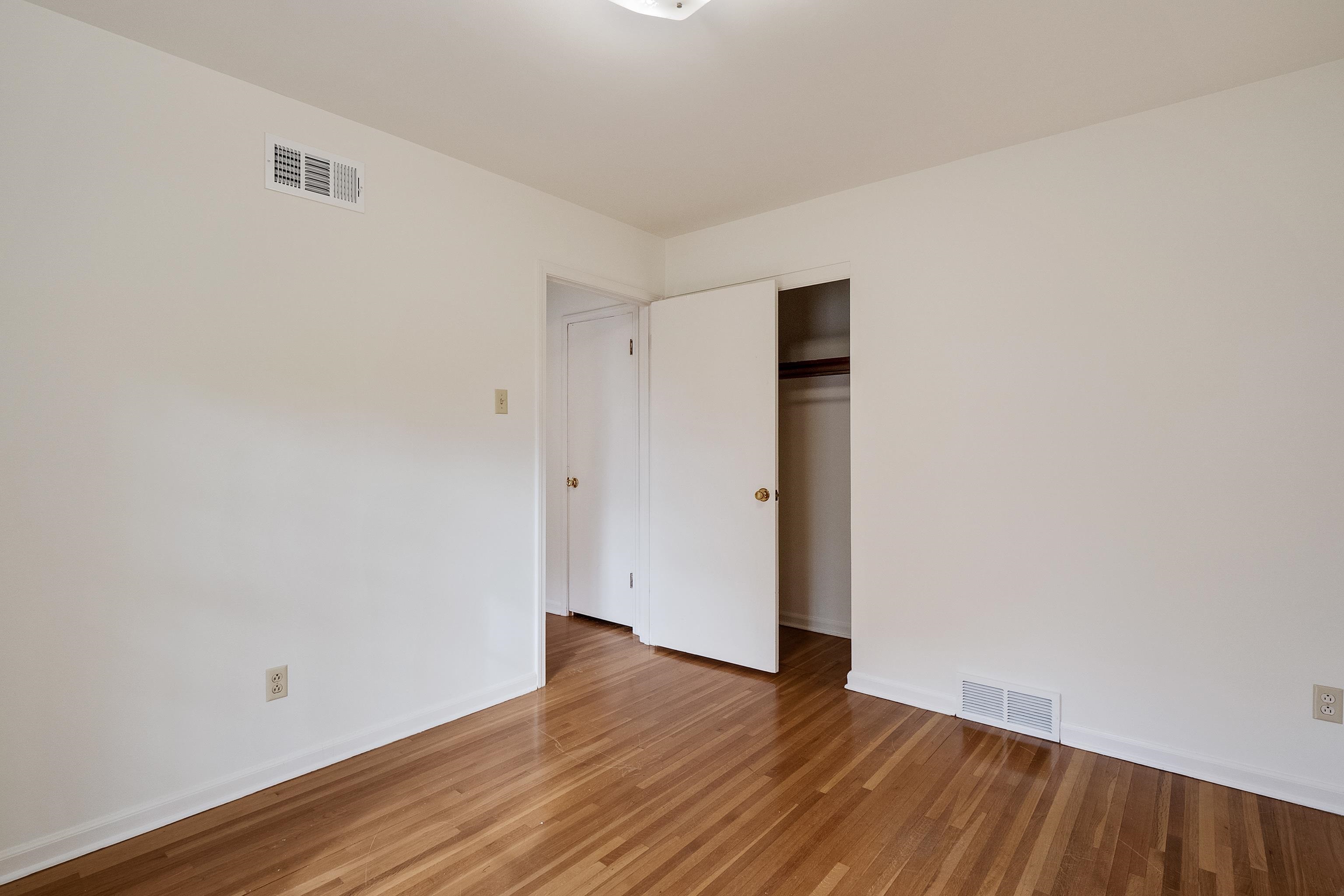 5500 Quince Road Memphis, TN 38119 - Photo 23 of 31 a view of an empty room with wooden floor