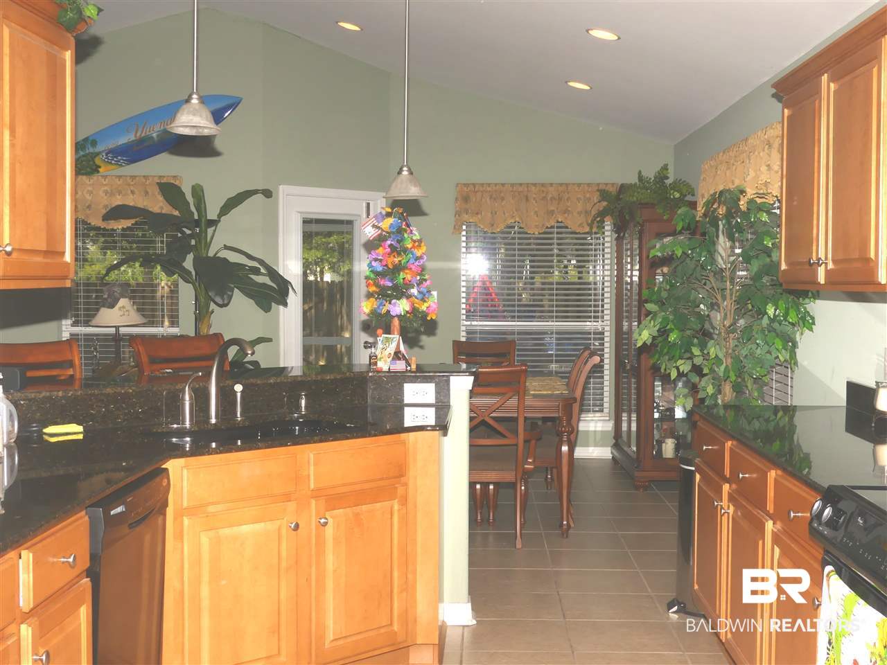 7117 Raintree Lane Gulf Shores, AL 36542 - Photo 8 of 23 Kitchen to Dining