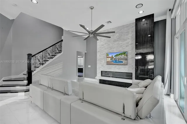 a bathroom with a double vanity sink toilet and shower