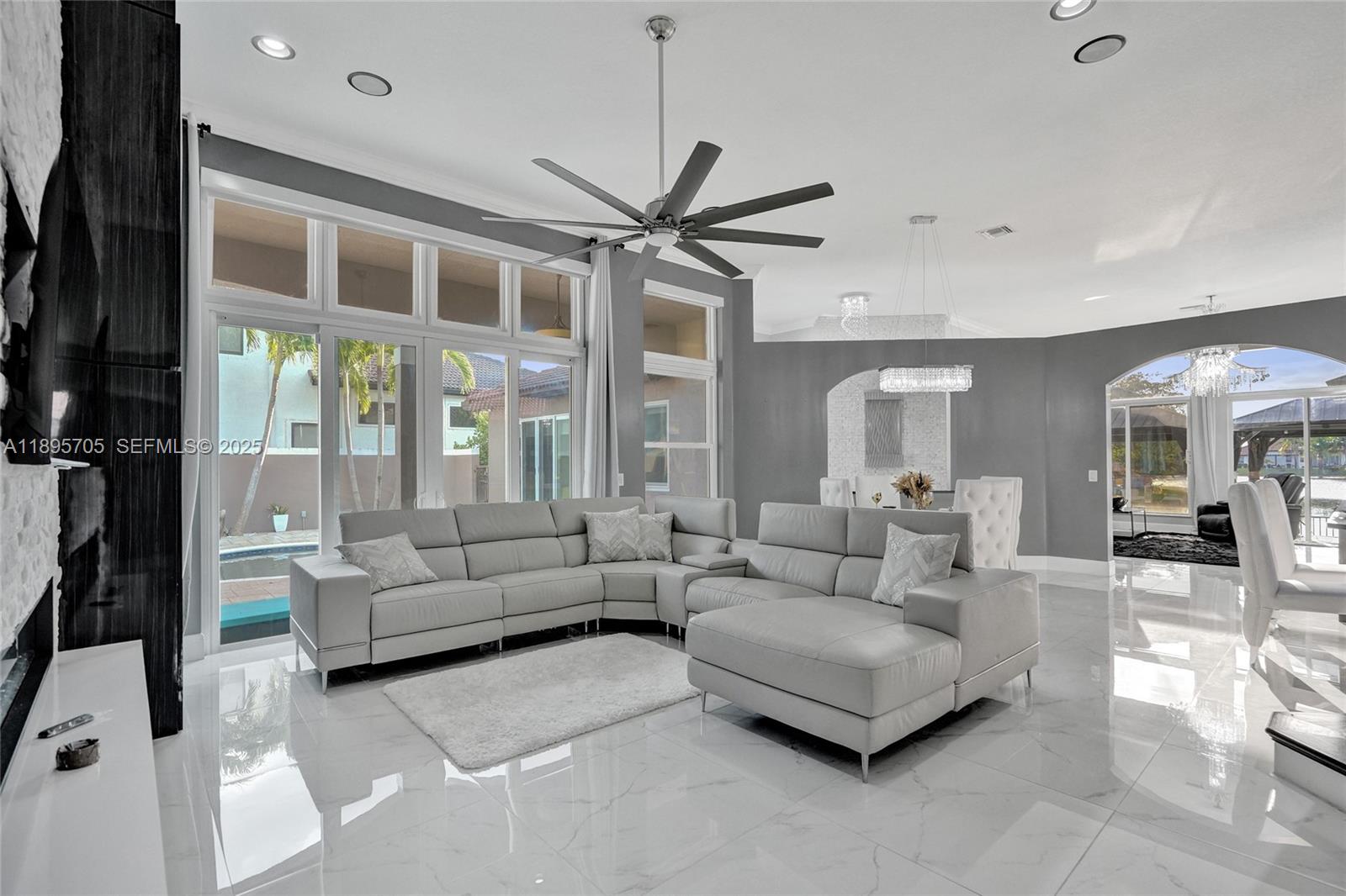 4248 Southwest 185th Avenue Miramar, FL 33029 - Photo 27 of 88 a living room with furniture and a large window