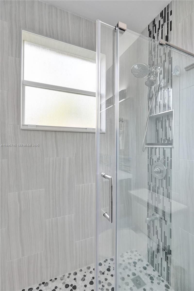 4248 Southwest 185th Avenue Miramar, FL 33029 - Photo 34 of 88 a bathroom with a shower