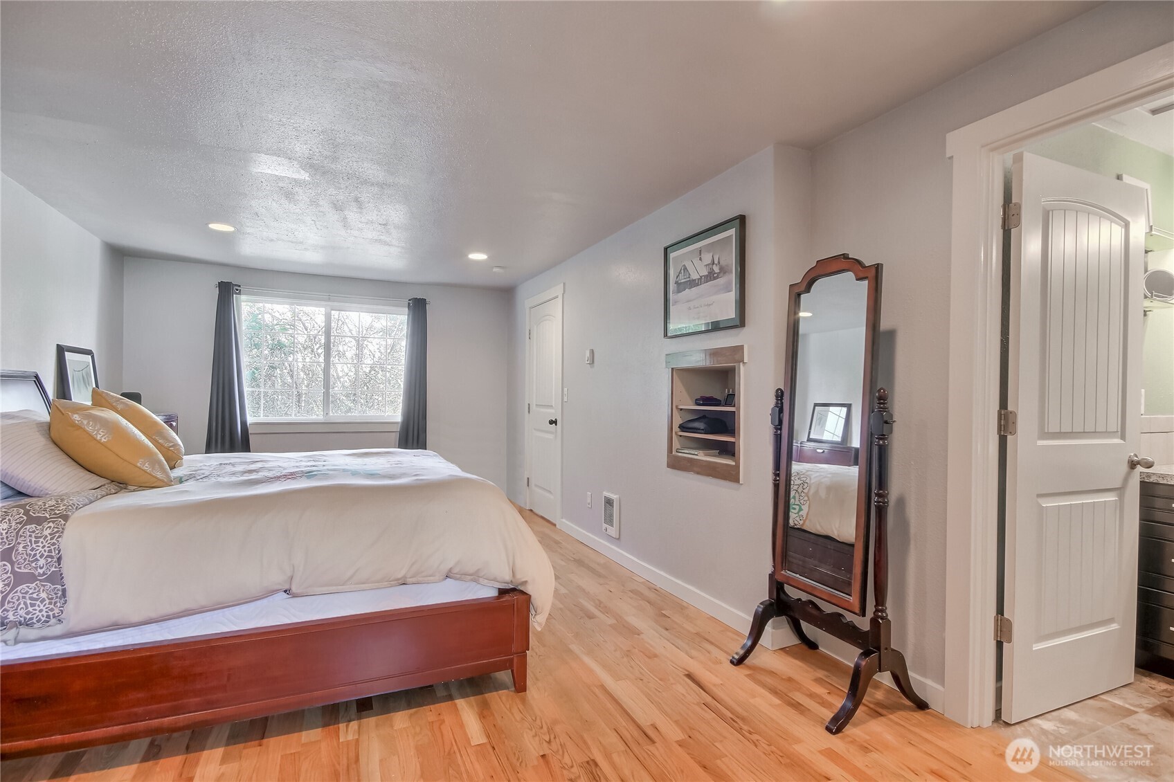 7417 South Prospect Street Tacoma, WA 98409 - Photo 17 of 35 a bed room with a bed and a window