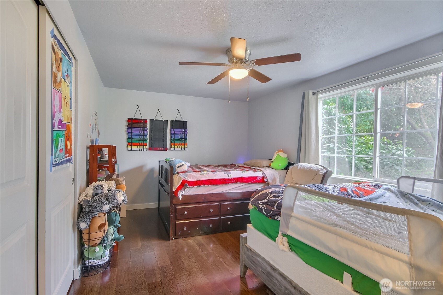 7417 South Prospect Street Tacoma, WA 98409 - Photo 21 of 35 a bedroom with furniture and a window