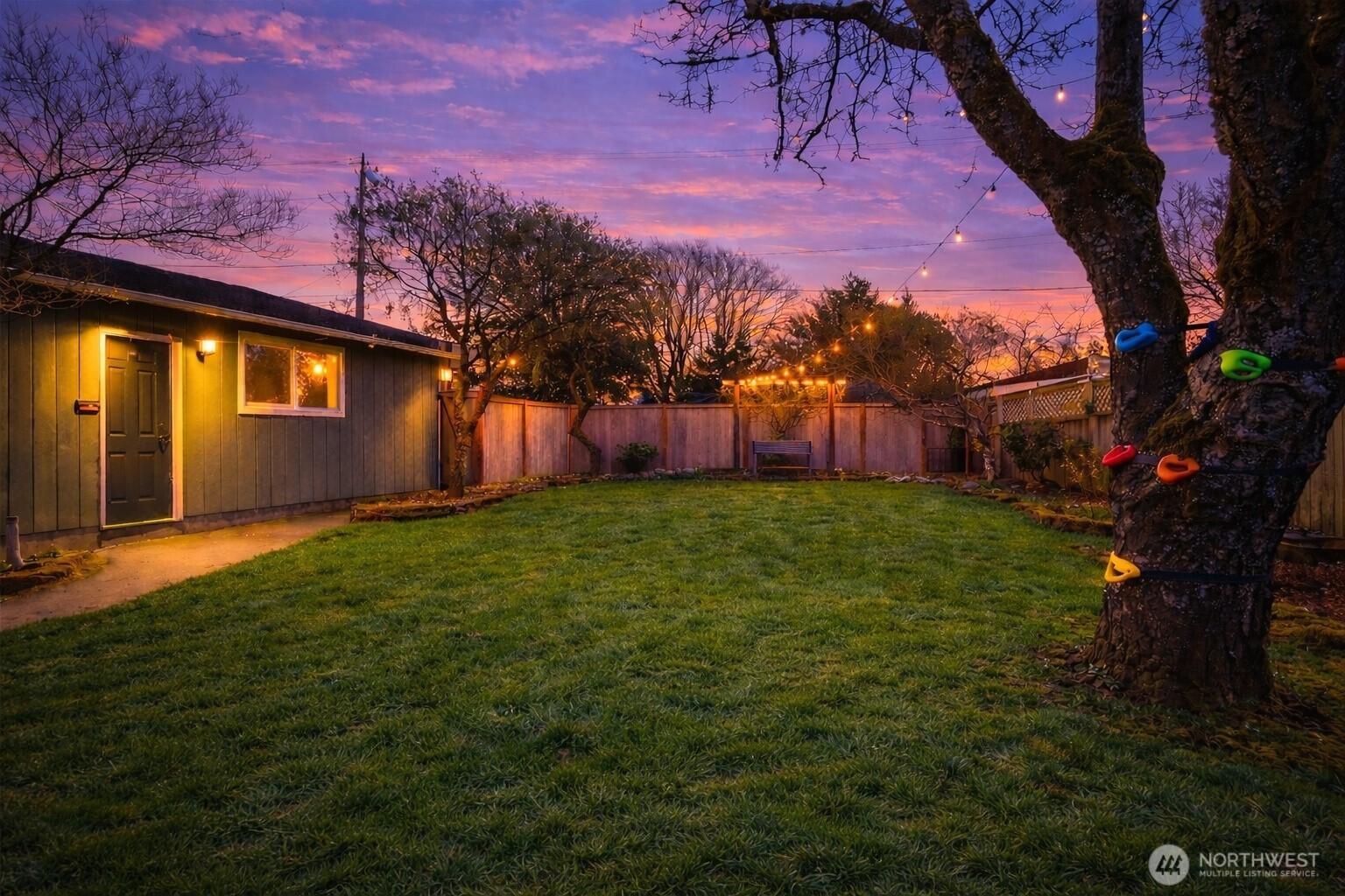 7417 South Prospect Street Tacoma, WA 98409 - Photo 27 of 35 a view of a backyard with a large tree