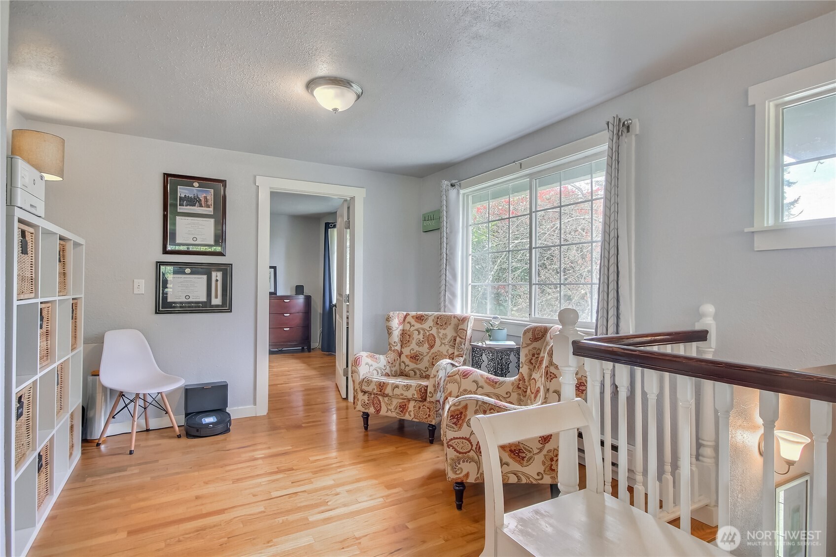 7417 South Prospect Street Tacoma, WA 98409 - Photo 5 of 35 a living room with furniture and a wooden floor