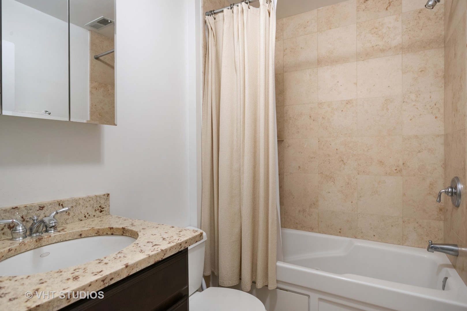 3339 West Byron Street, Unit 1 Chicago, IL 60618 - Photo 11 of 12 a bathroom with a granite countertop sink and a mirror