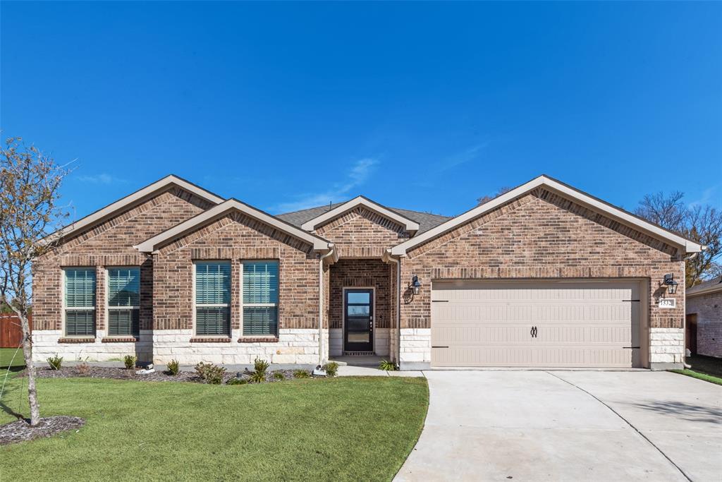 1532 Ruby Jewel Lane Anna, TX 75409 - Photo 3 of 19 a front view of a house with a yard and garage