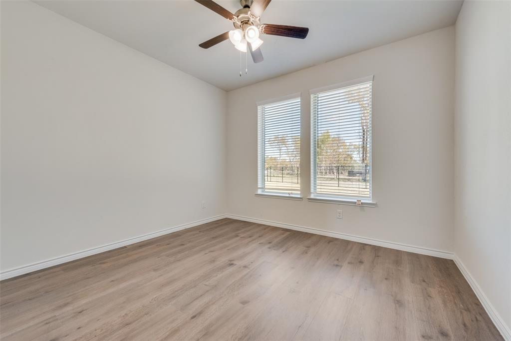 1532 Ruby Jewel Lane Anna, TX 75409 - Photo 10 of 19 wooden floor in an empty room with a window