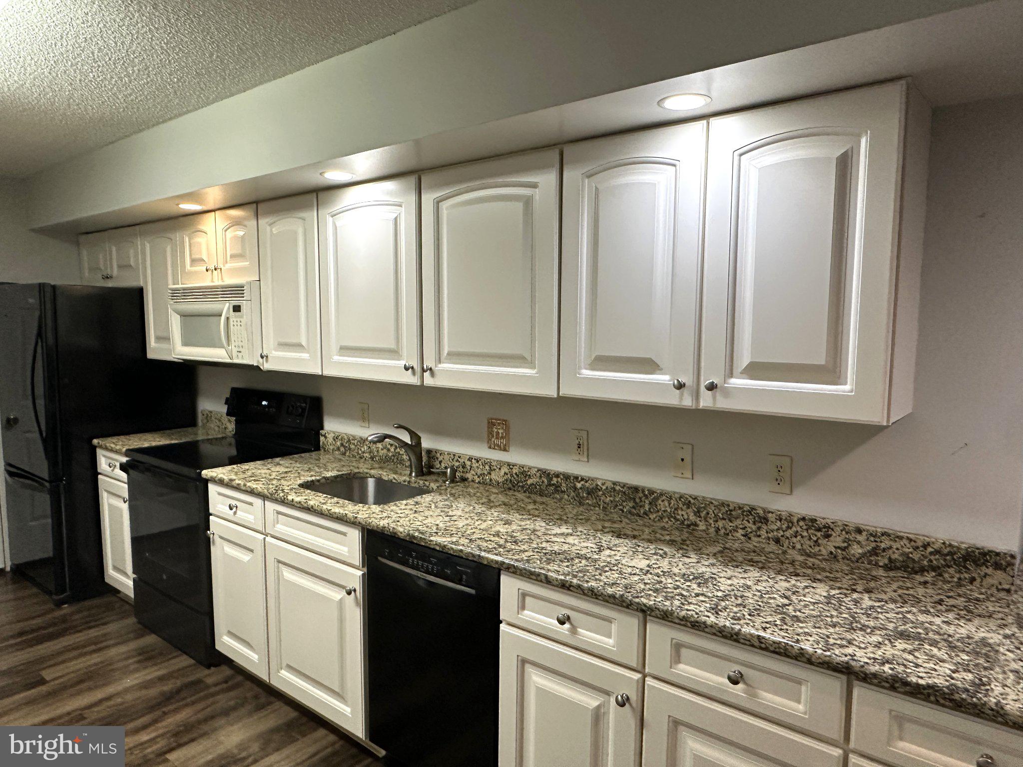 613 Brandon Road Norristown, PA 19403 - Photo 6 of 22 Modern kitchen with granite countertopp.