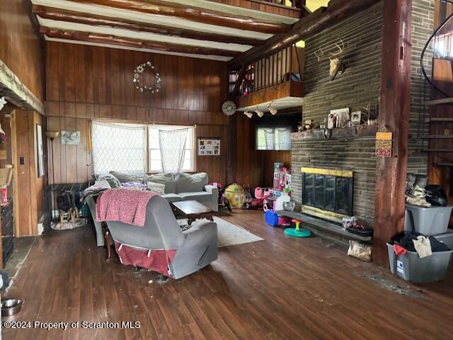 907 Rattlesnake Hill Road Meshoppen, PA 18630 - Photo 9 of 21 a living room with furniture and a fireplace