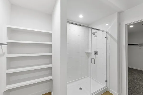 a view of a room with racks on the wall