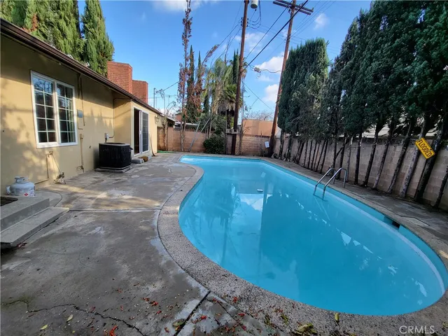 a view of a backyard with a patio
