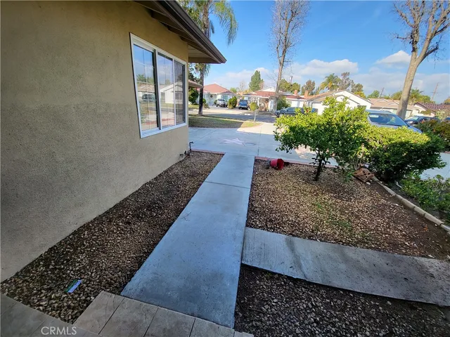 a view of front door with wooden door