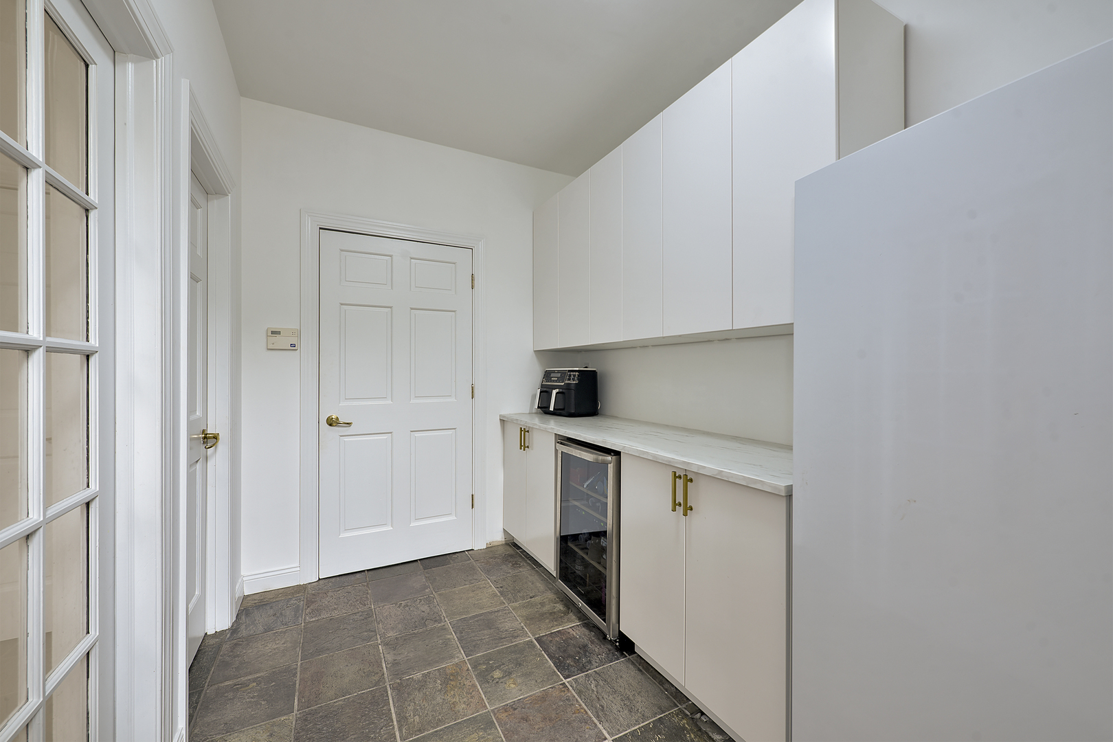 144 North Highland Road Inverness, IL 60067 - Photo 9 of 49 a kitchen with a stove top oven and cabinets