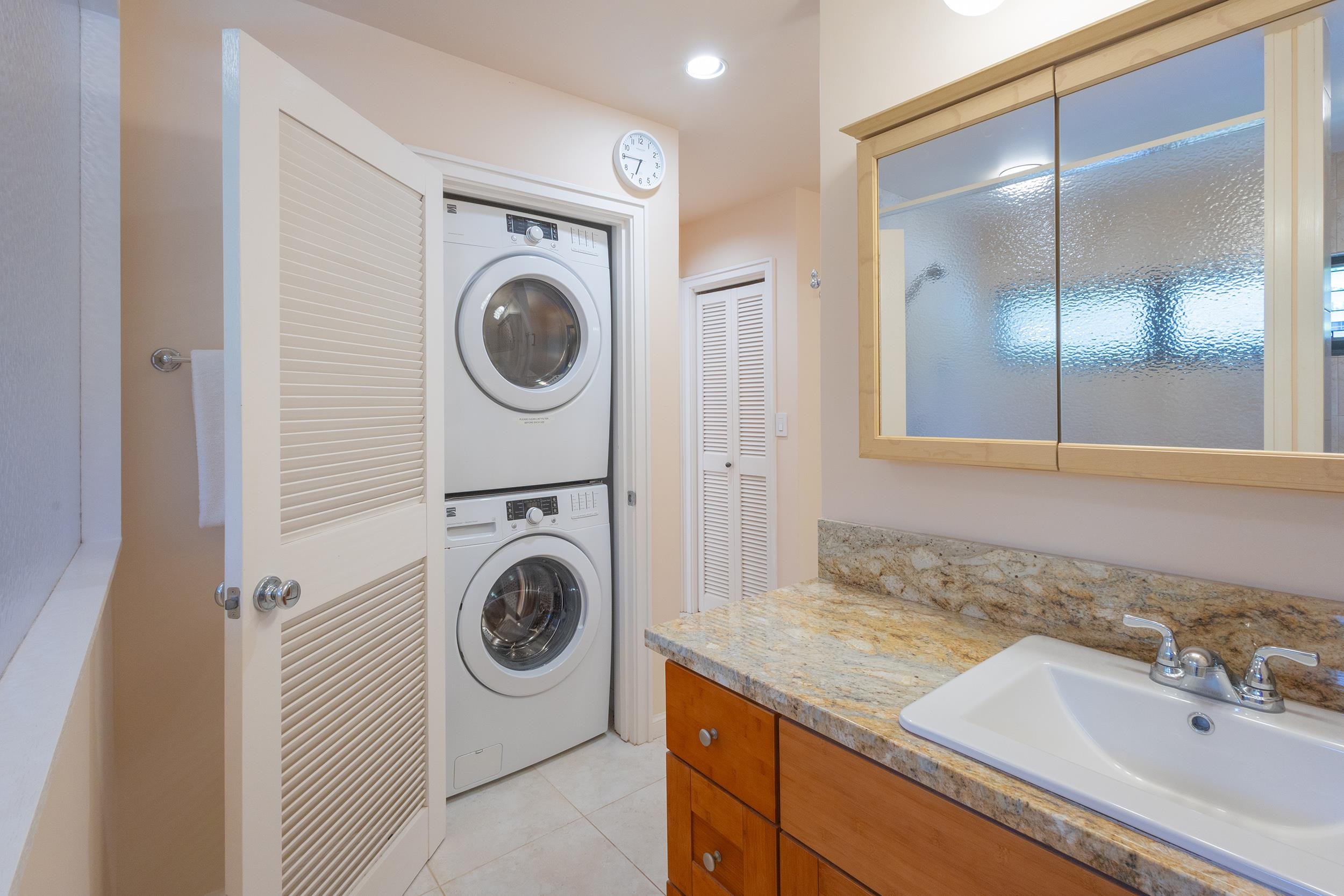 100 Ridge Road, Unit 723 Lahaina, HI 96761 - Photo 30 of 48 a utility room with sink dryer and washer
