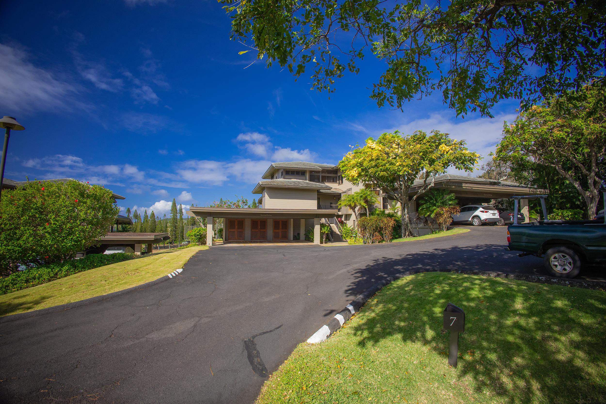 100 Ridge Road, Unit 723 Lahaina, HI 96761 - Photo 33 of 48 a front view of a house with a yard